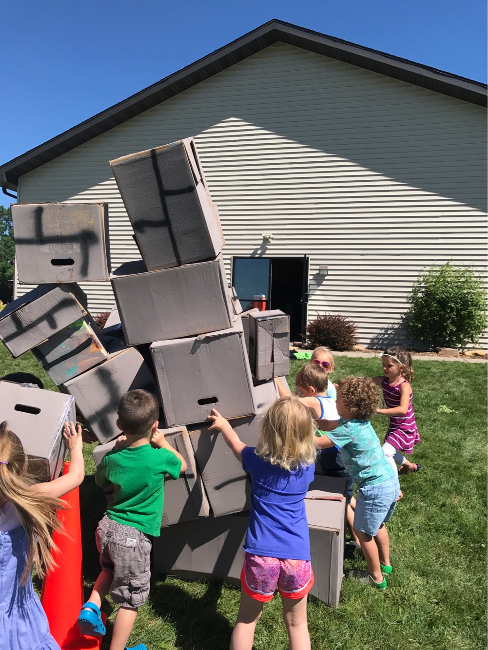 Kid's playing a game outside during Kingdoms VBS last year.